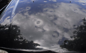 hail damage on the surface of a vehicle